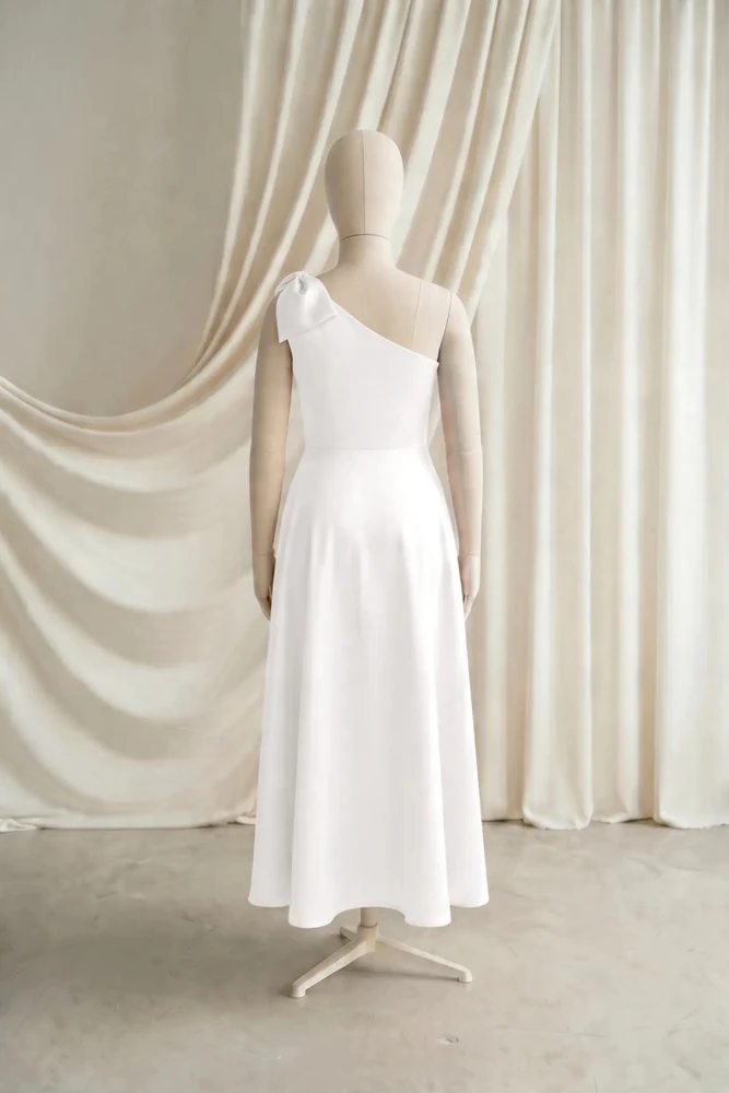 mara-ivory-satin-junior-bridesmaid-dress-thth-back Mara Ivory satin junior bridesmaid dress by TH&TH — back view of the A-line skirt