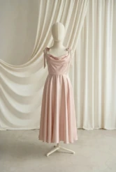 Tilly Blush Pink satin junior bridesmaid dress by TH&TH — front, showing the ribbon shoulder ties and cowl neckline