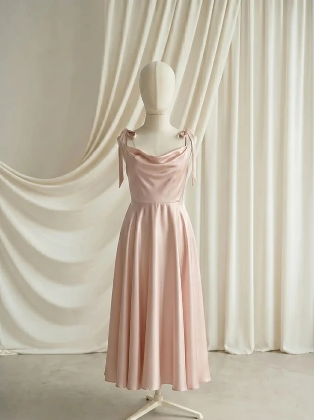 Tilly Blush Pink satin junior bridesmaid dress by TH&TH — front, showing the ribbon shoulder ties and cowl neckline